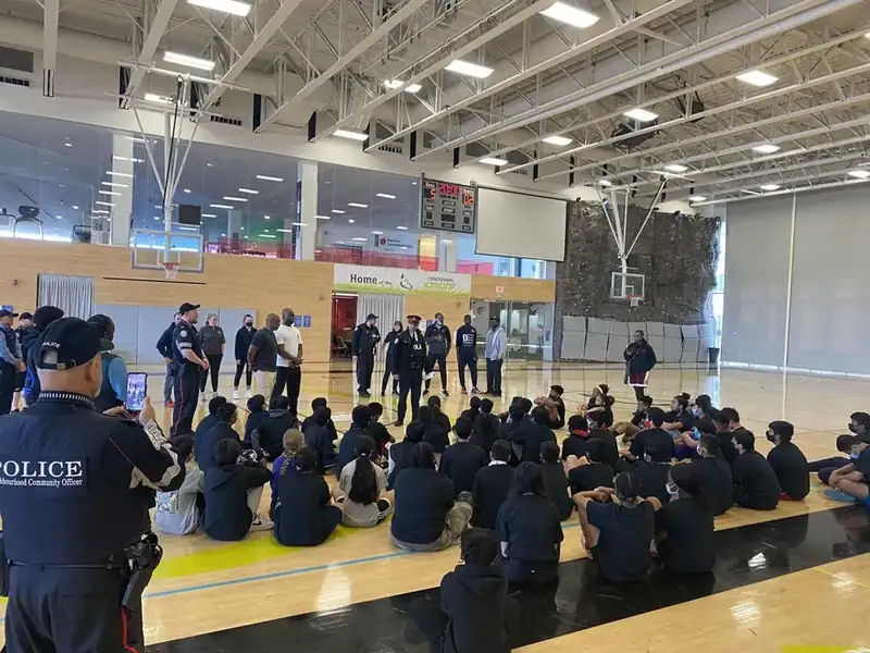 Youth gathered on the court at Woburn Basketball Day at Centennial College